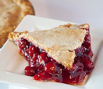 Slice of Cherry Pie on a plate